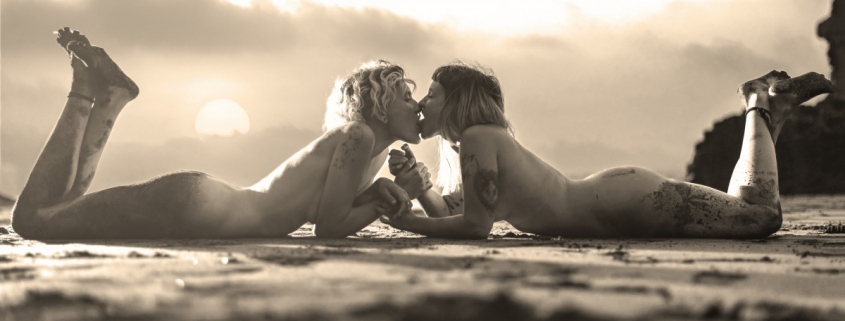 same sex marriage - lovely lesbians kissing on a beach